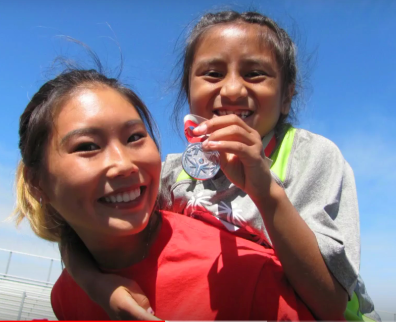 Two smiling girls.