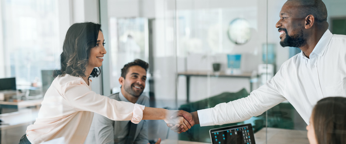 two people shaking hands