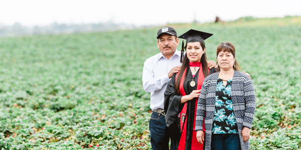 The photo of CSP master's student Erica Alfaro and her parents that went viral.