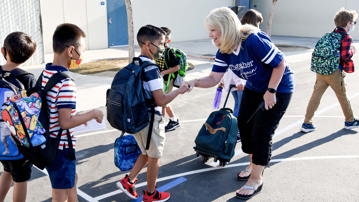 Principal Beth Beuttner greeted students at Fresno's Eaton Elementary School.