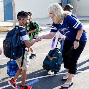 Principal Beth Beuttner greeted students at Fresno's Eaton Elementary School.