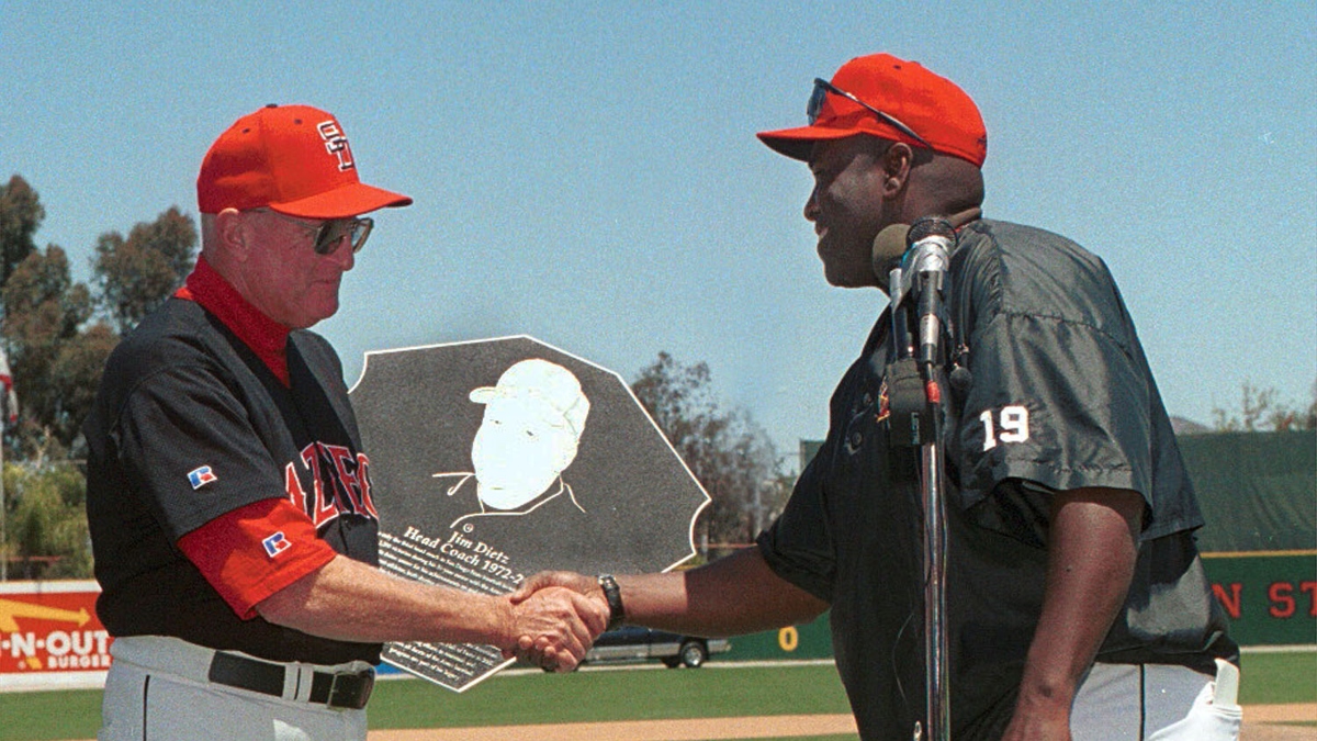 Jim Dietz shakes hands with Tony Gwynn