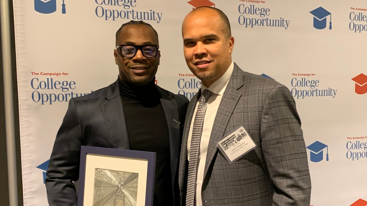 Frank Harris III (left) with Scott Thayer, interim president of San Bernardino Valley College.