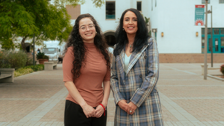 Assistant professor Wendy Ochoa (left) and Rosie Villafana-Hatcher, director of the Early Assessment Program, posed on Centennial Walkway.