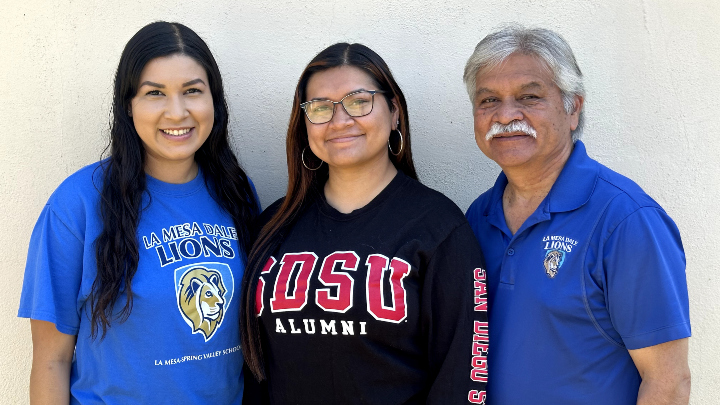 Briana Martinez poses with her sister and father.