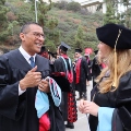 Graduate students from the Class of 2025 celebrate outside Viejas Arena.
