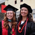 Graduate students from the Class of 2025 celebrate outside Viejas Arena. 