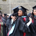Graduate students from the Class of 2025 celebrate outside Viejas Arena. 