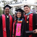 Graduate students from the Class of 2025 celebrate outside Viejas Arena. 