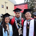 Graduate students from the Class of 2025 celebrate outside Viejas Arena. 