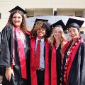 Undergraduate students from the Class of 2025 celebrate outside Viejas Arena.