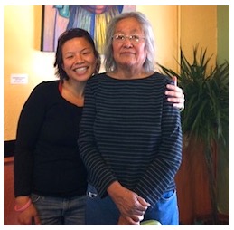 student with Native American artist